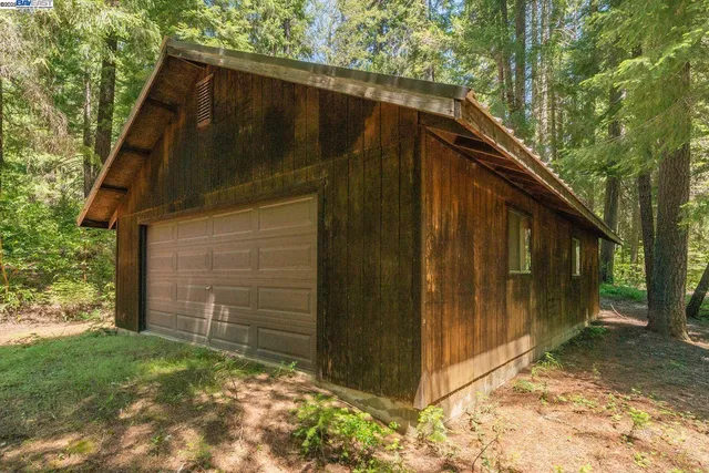 a view of a balcony with wooden floor