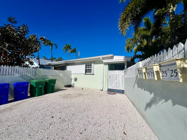 a view of street and small yard