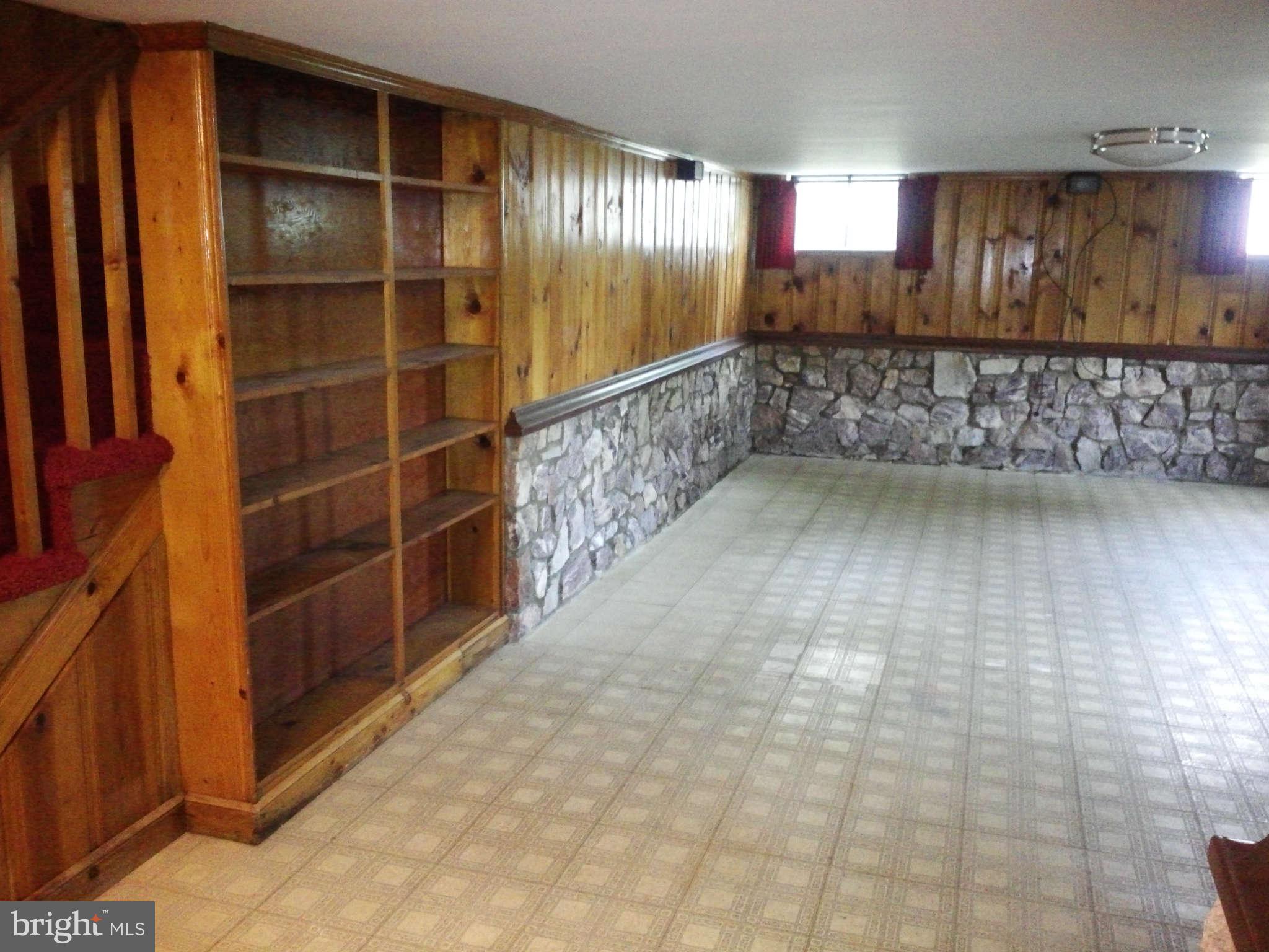 9217 Baltimore Road Frederick, MD 21704 - Photo 18 of 26 Recreation room with built in bookshelves
