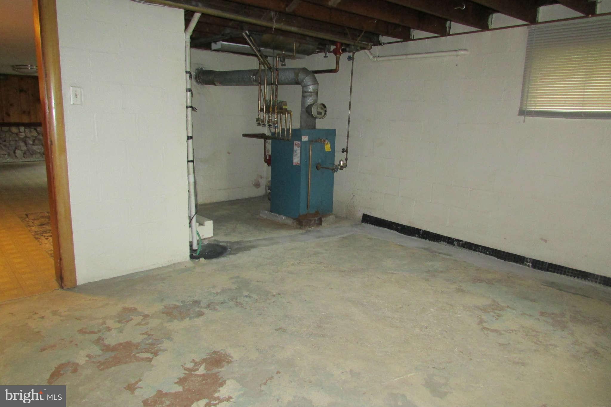 9217 Baltimore Road Frederick, MD 21704 - Photo 19 of 26 unfinished space in furnnce room