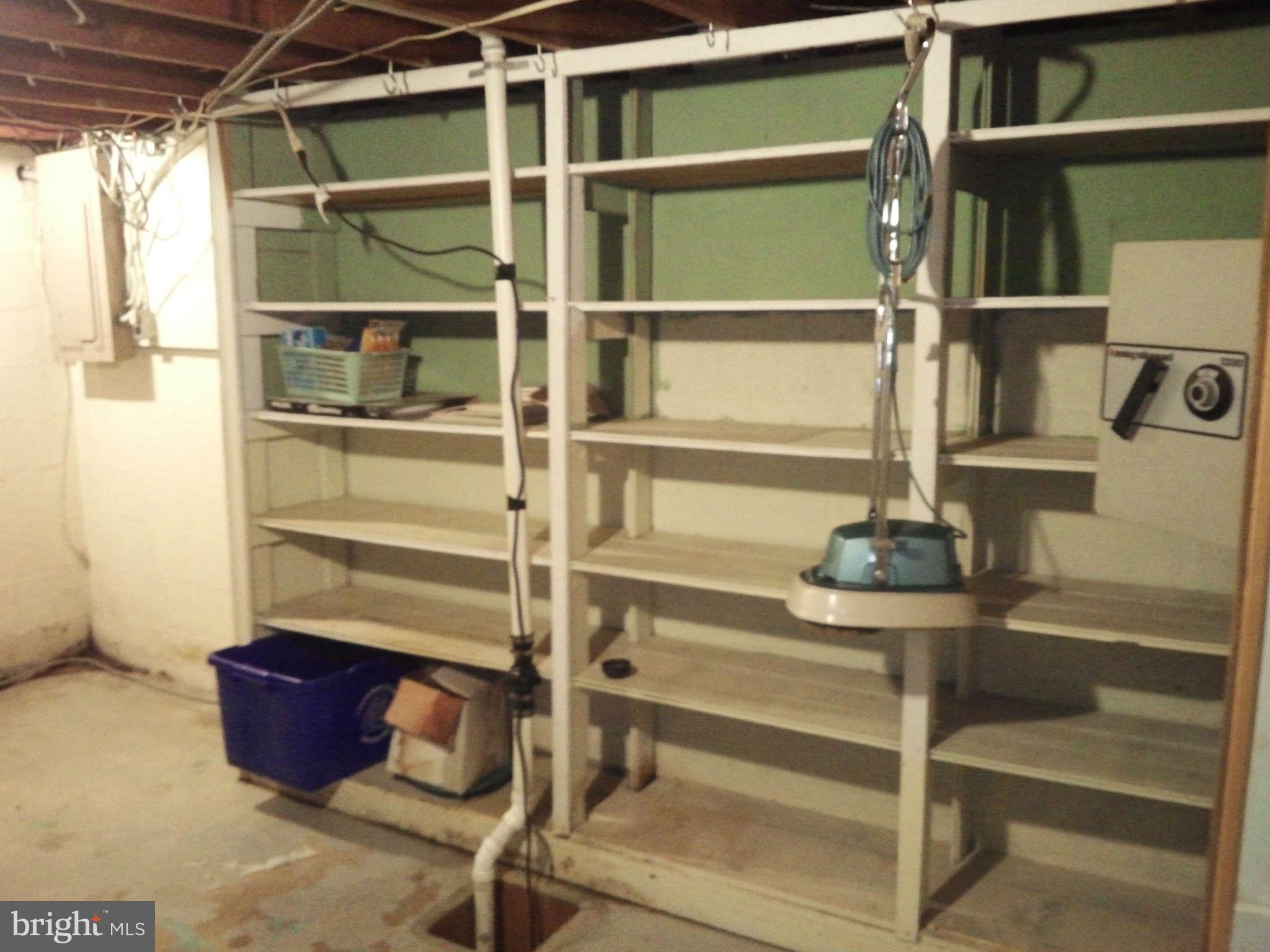 9217 Baltimore Road Frederick, MD 21704 - Photo 23 of 26 Lots of built in shelving in basement