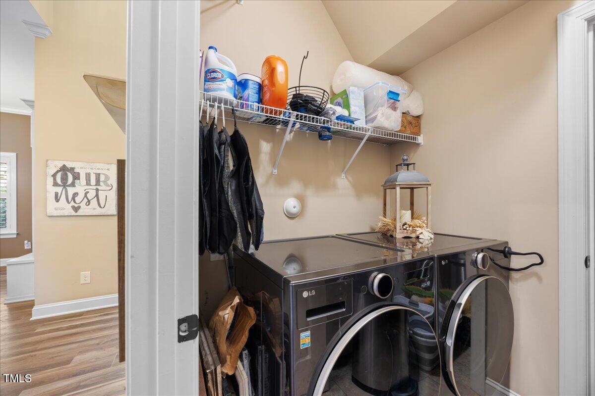 1300 Formal Garden Way Raleigh, NC 27603 - Photo 17 of 45 a utility room with dryer and washer