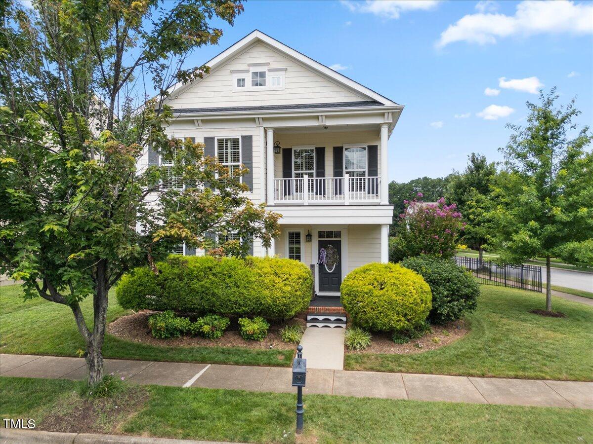1300 Formal Garden Way Raleigh, NC 27603 - Photo 2 of 45 a front view of a house with garden
