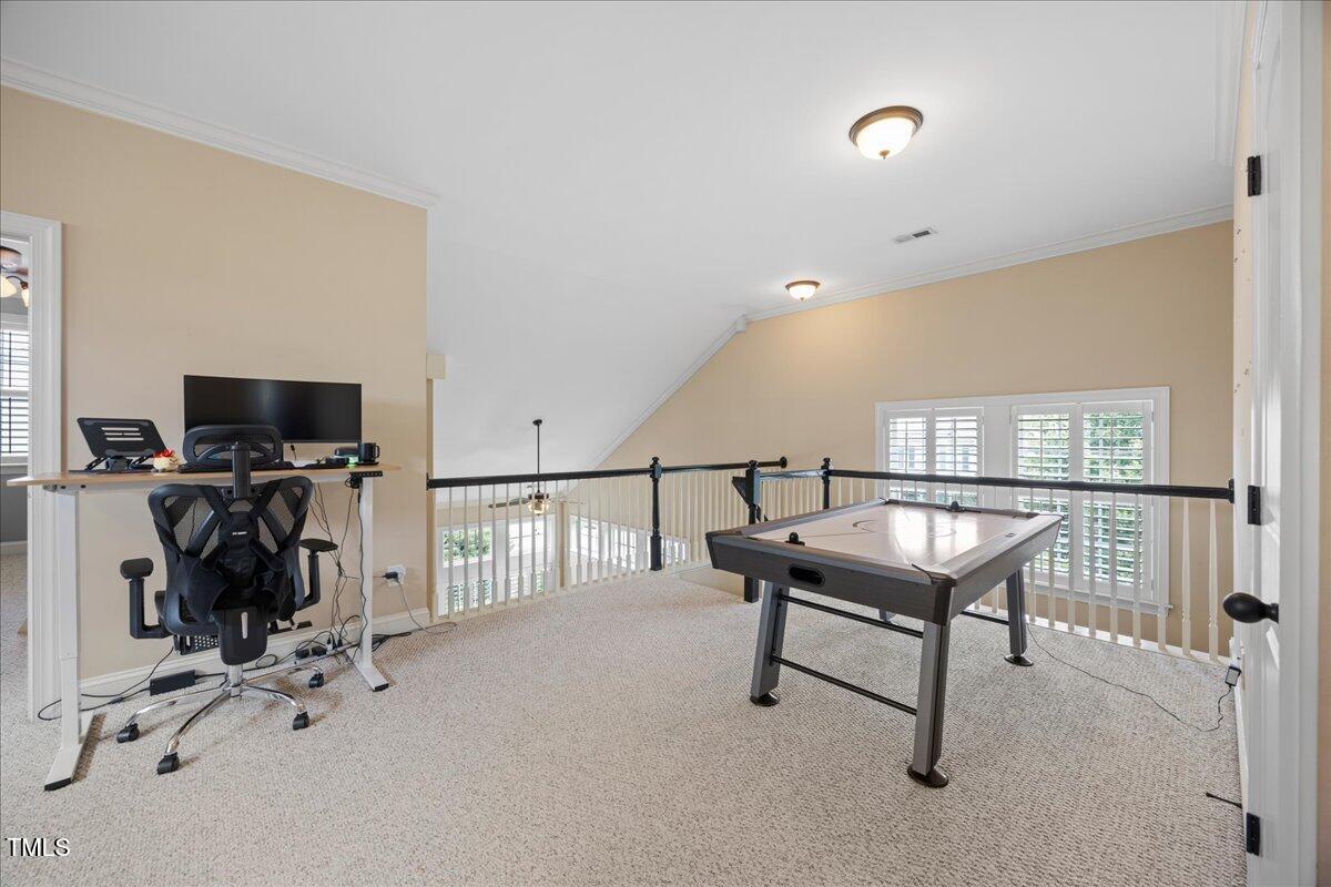 1300 Formal Garden Way Raleigh, NC 27603 - Photo 24 of 45 a view of a workspace with furniture and a window