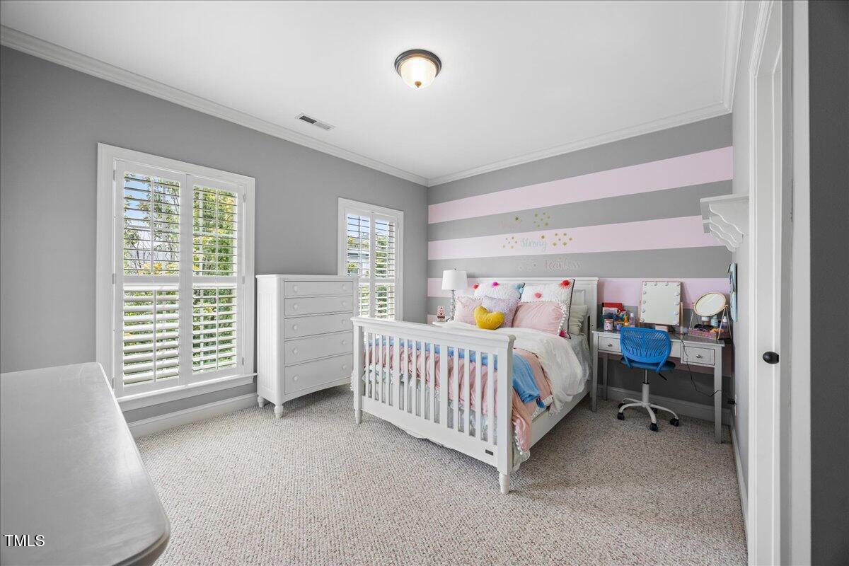 1300 Formal Garden Way Raleigh, NC 27603 - Photo 28 of 45 a bed room with furniture and a window