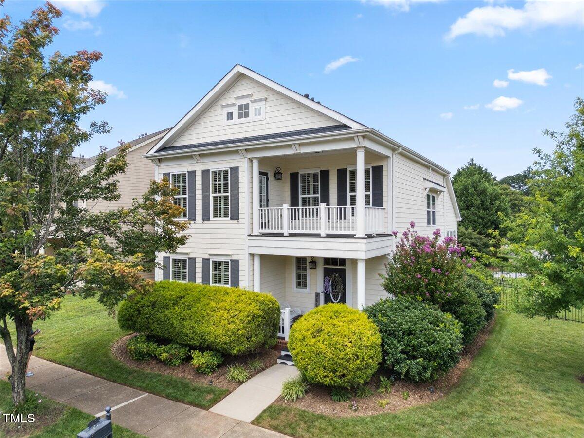 1300 Formal Garden Way Raleigh, NC 27603 - Photo 3 of 45 a front view of a house with garden