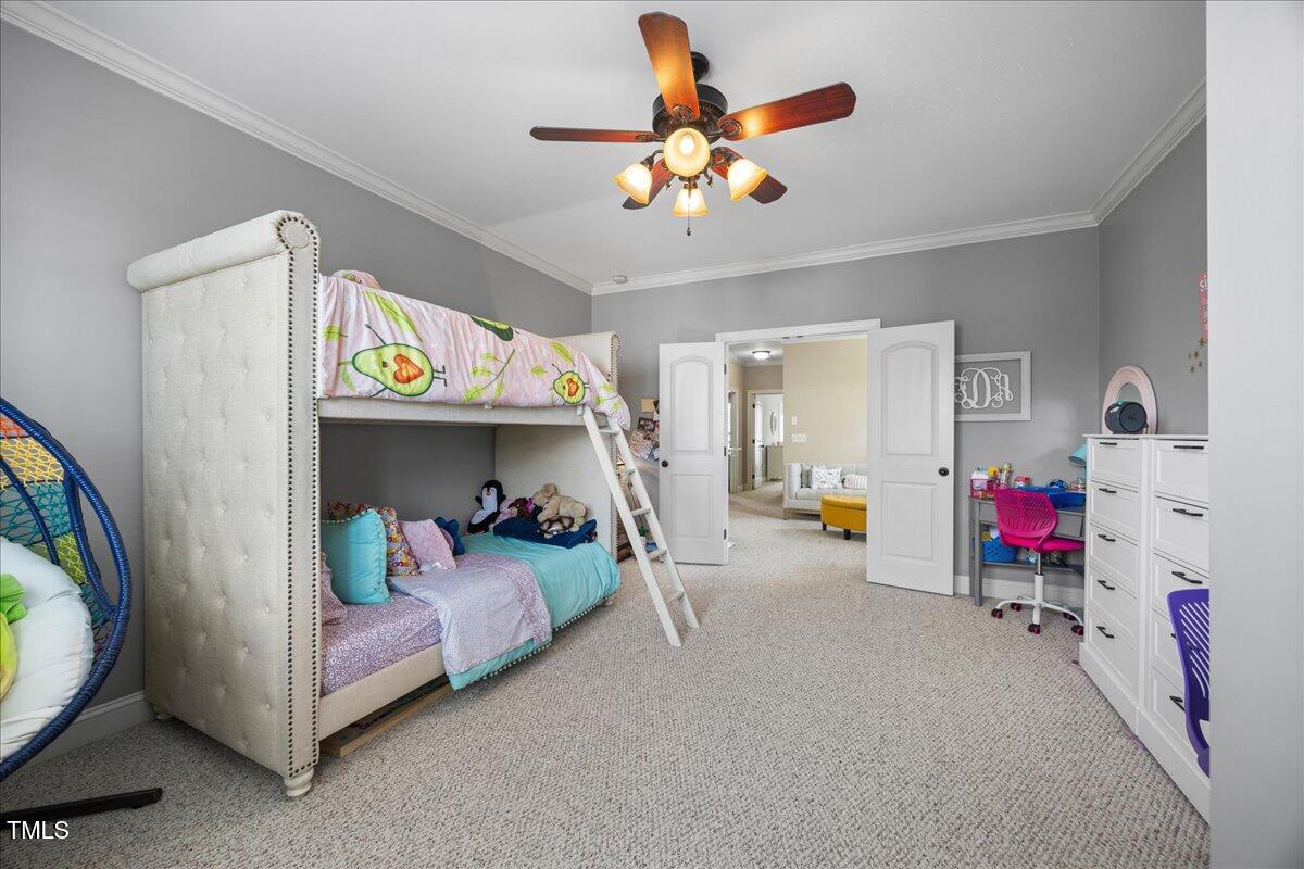 1300 Formal Garden Way Raleigh, NC 27603 - Photo 31 of 45 a bedroom with furniture and a chandelier