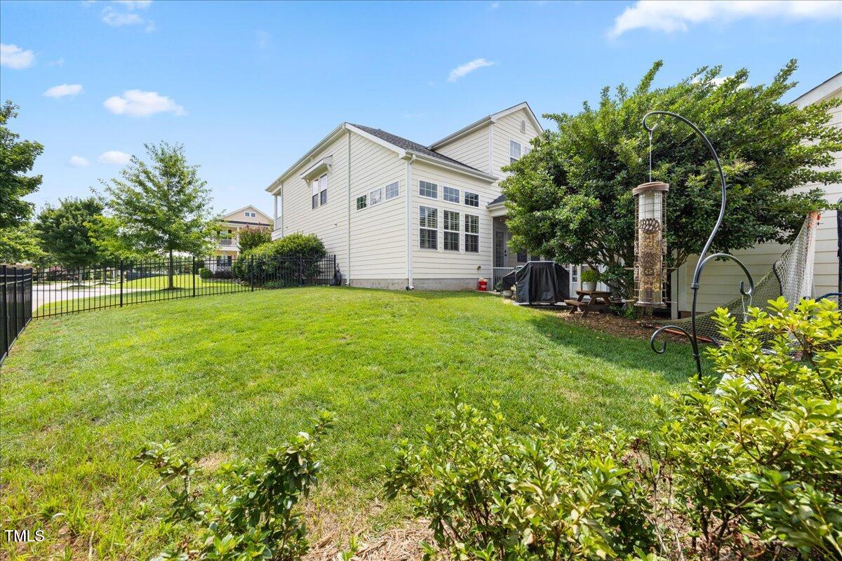 1300 Formal Garden Way Raleigh, NC 27603 - Photo 35 of 45 a view of a house with a yard