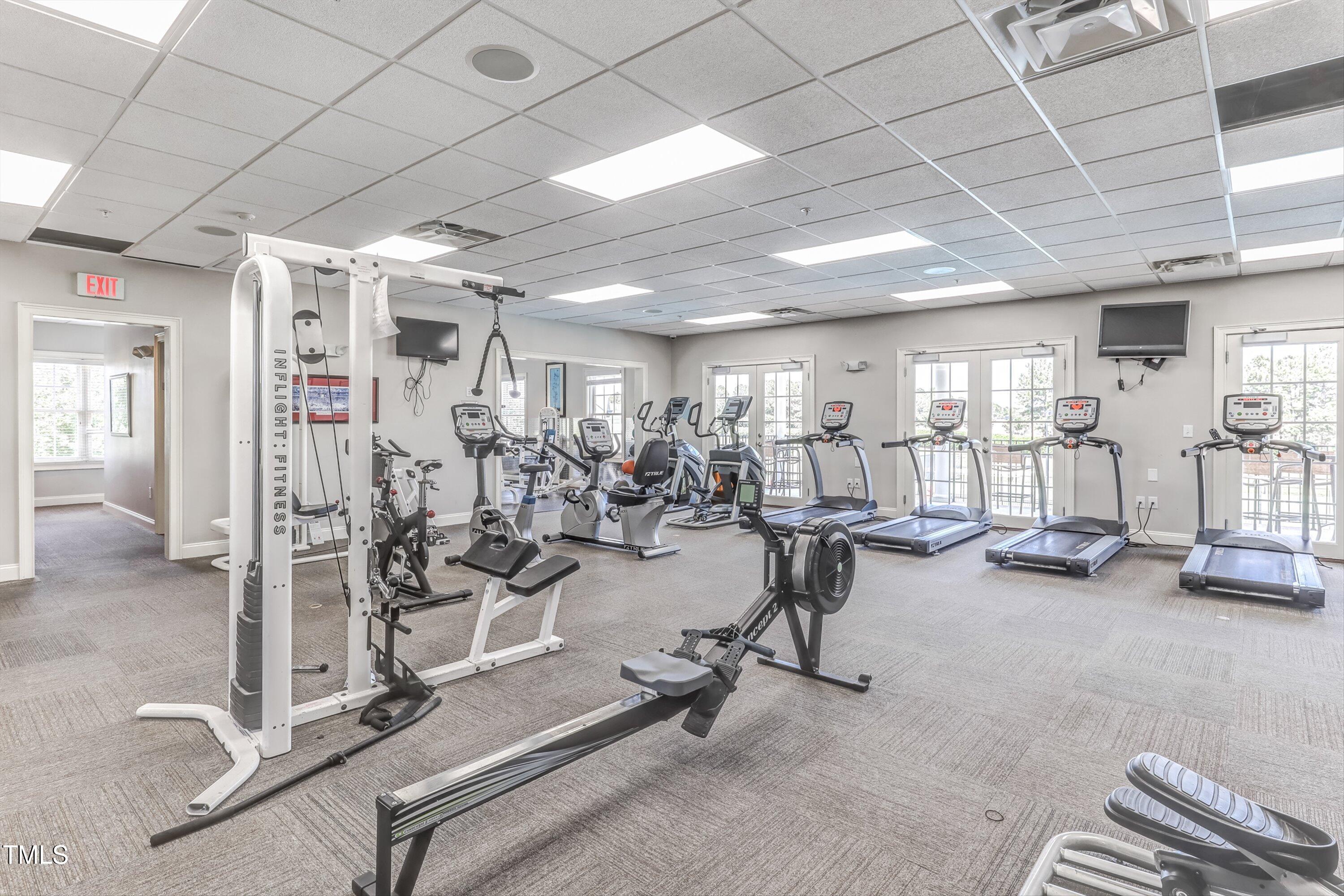 1300 Formal Garden Way Raleigh, NC 27603 - Photo 42 of 45 a view of a room with gym equipment