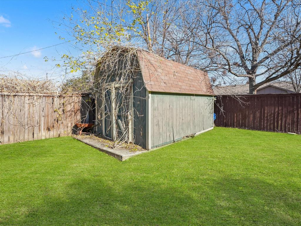 516 South Alabama Street Celina, TX 75009 - Photo 26 of 31 a view of an house with backyard and a tree