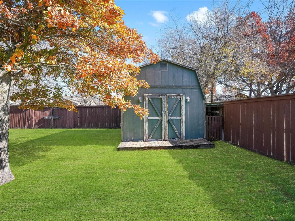 516 South Alabama Street Celina, TX 75009 - Photo 28 of 31 a front view of house with a garden