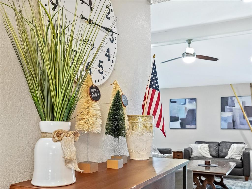 516 South Alabama Street Celina, TX 75009 - Photo 10 of 31 a living room with blue lights with furniture and a potted plant