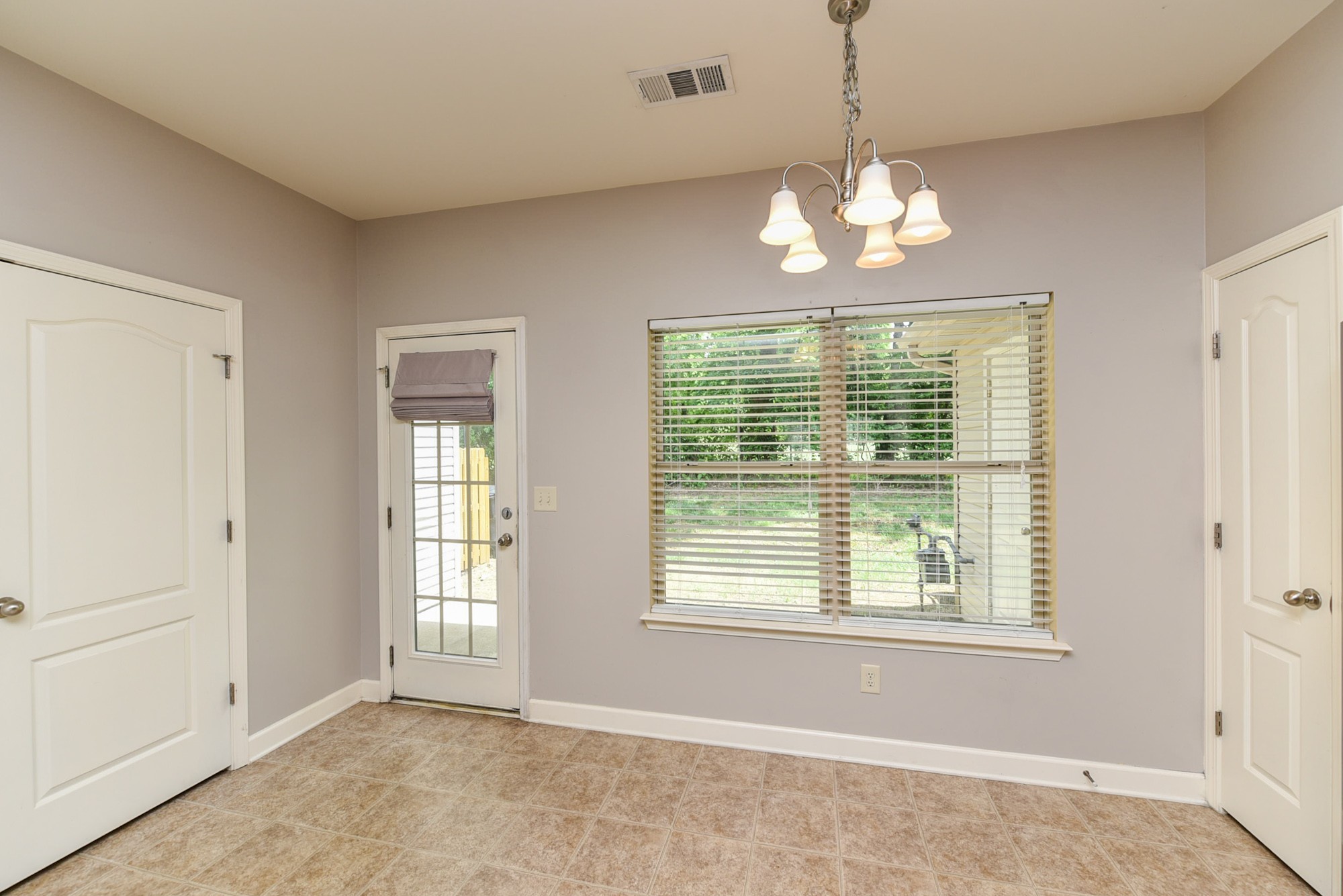 735 Tulip Grove Road, Unit 311 Hermitage, TN 37076 - Photo 12 of 35 a view of a windows and chandelier in a room