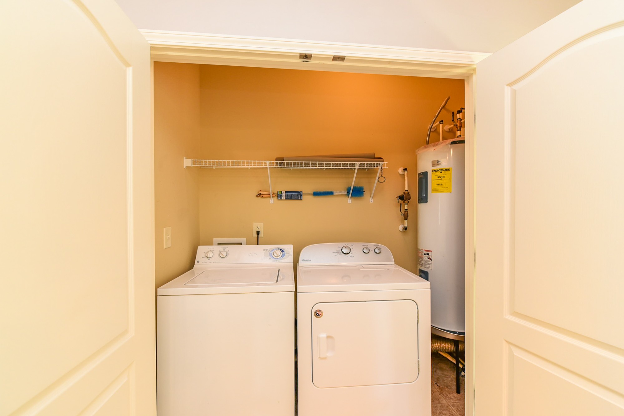735 Tulip Grove Road, Unit 311 Hermitage, TN 37076 - Photo 13 of 35 a utility room with dryer and washer