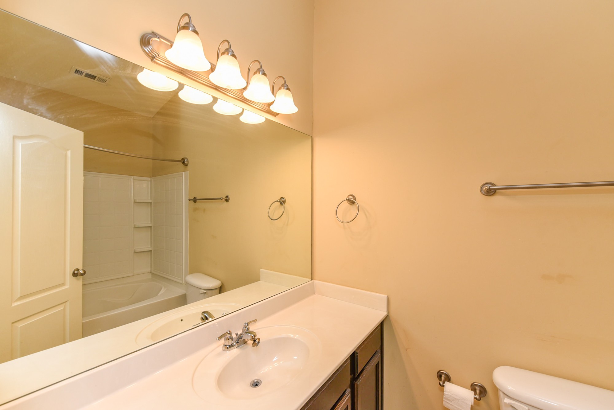 735 Tulip Grove Road, Unit 311 Hermitage, TN 37076 - Photo 18 of 35 a bathroom with a sink a toilet and shower