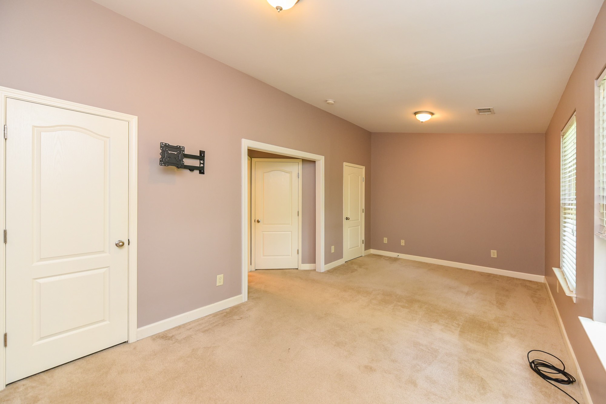 735 Tulip Grove Road, Unit 311 Hermitage, TN 37076 - Photo 20 of 35 an empty room with windows
