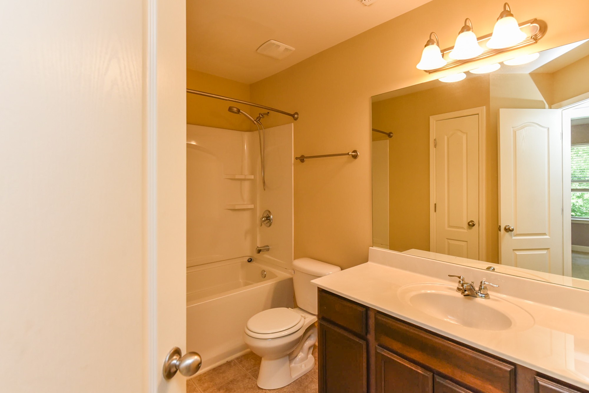 735 Tulip Grove Road, Unit 311 Hermitage, TN 37076 - Photo 22 of 35 a bathroom with a sink a toilet and shower