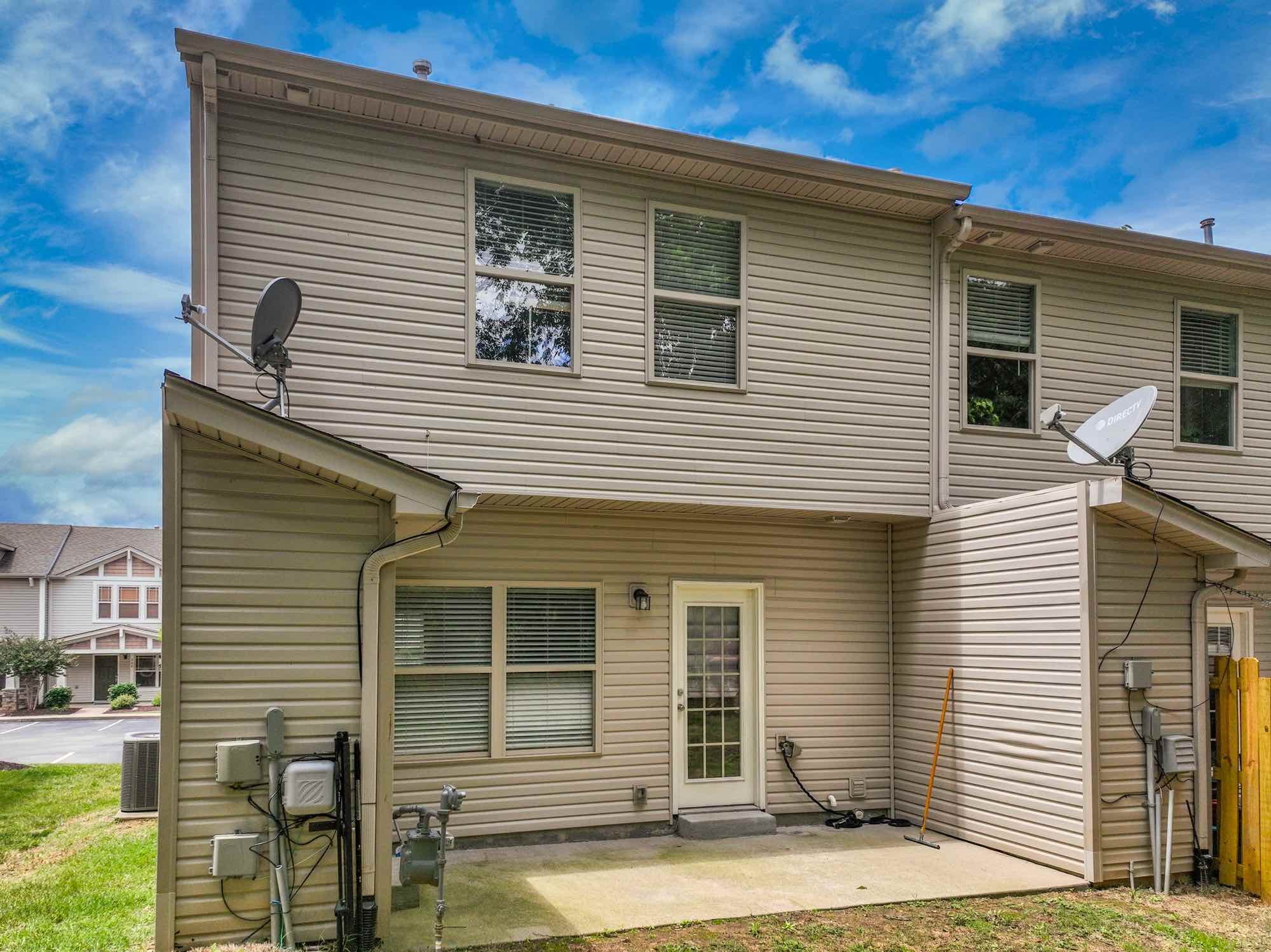 735 Tulip Grove Road, Unit 311 Hermitage, TN 37076 - Photo 29 of 35 a view of a house with a patio