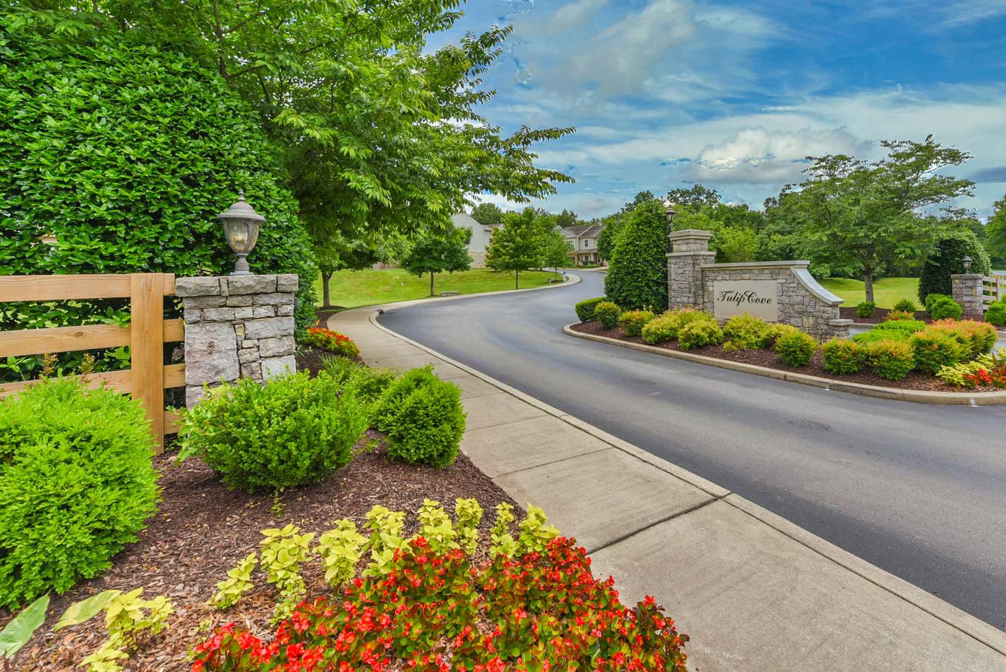 735 Tulip Grove Road, Unit 311 Hermitage, TN 37076 - Photo 34 of 35 a view of a garden with a pathway