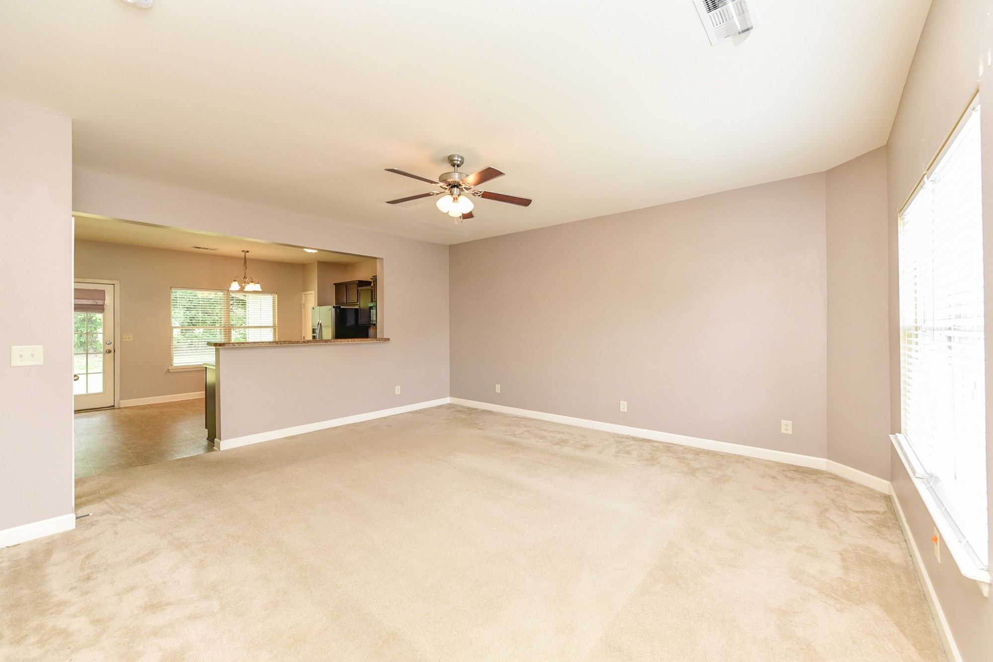 735 Tulip Grove Road, Unit 311 Hermitage, TN 37076 - Photo 5 of 35 a view of an empty room with a window