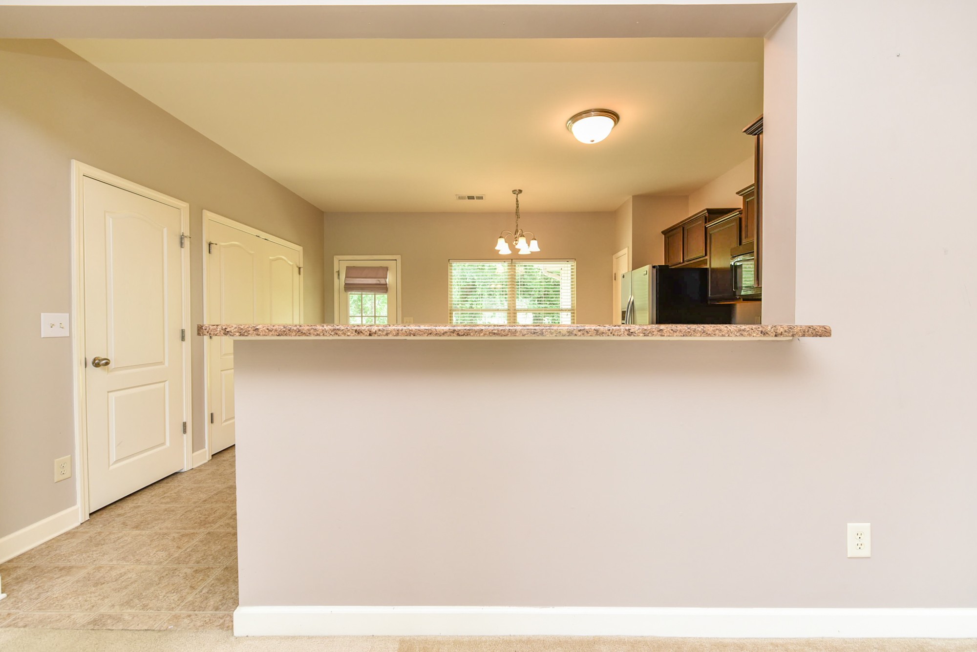 735 Tulip Grove Road, Unit 311 Hermitage, TN 37076 - Photo 8 of 35 a view interior of the house and chandelier