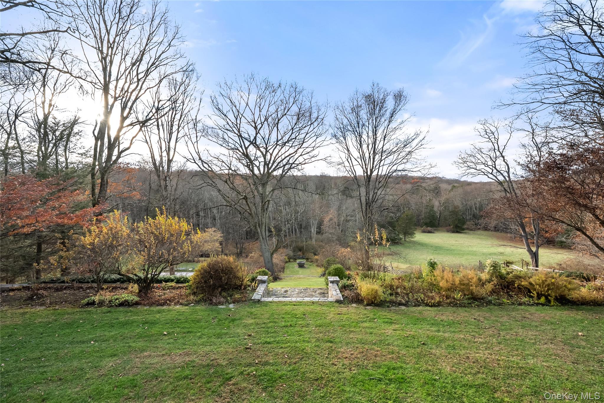 448 Long Ridge Road Pound Ridge, NY 10576 - Photo 41 of 49 View of grassy yard with pool in distance.