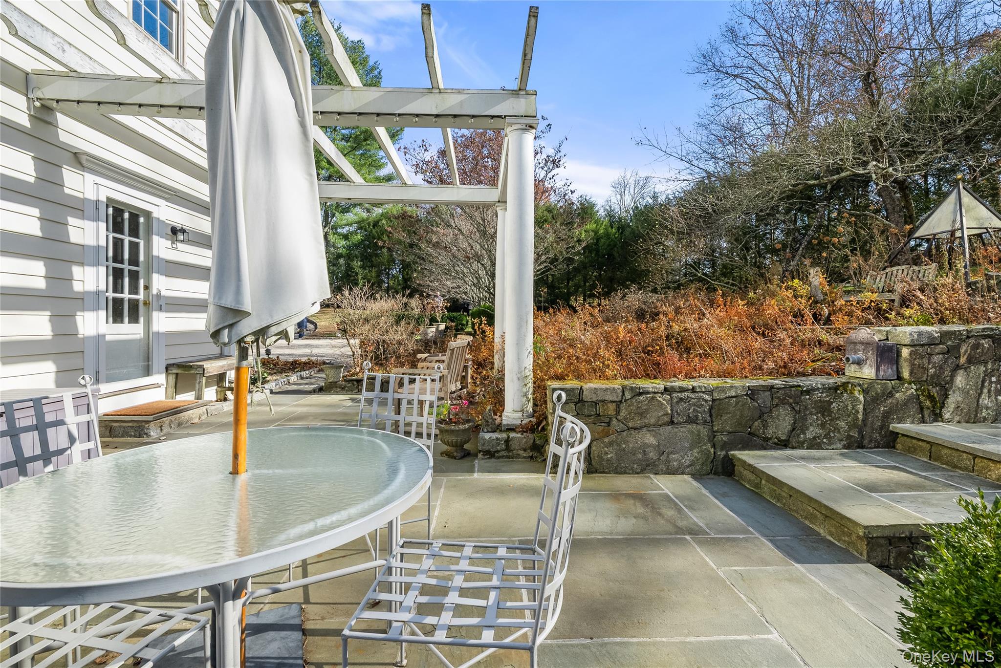 448 Long Ridge Road Pound Ridge, NY 10576 - Photo 46 of 49 View of patio with outdoor dining space