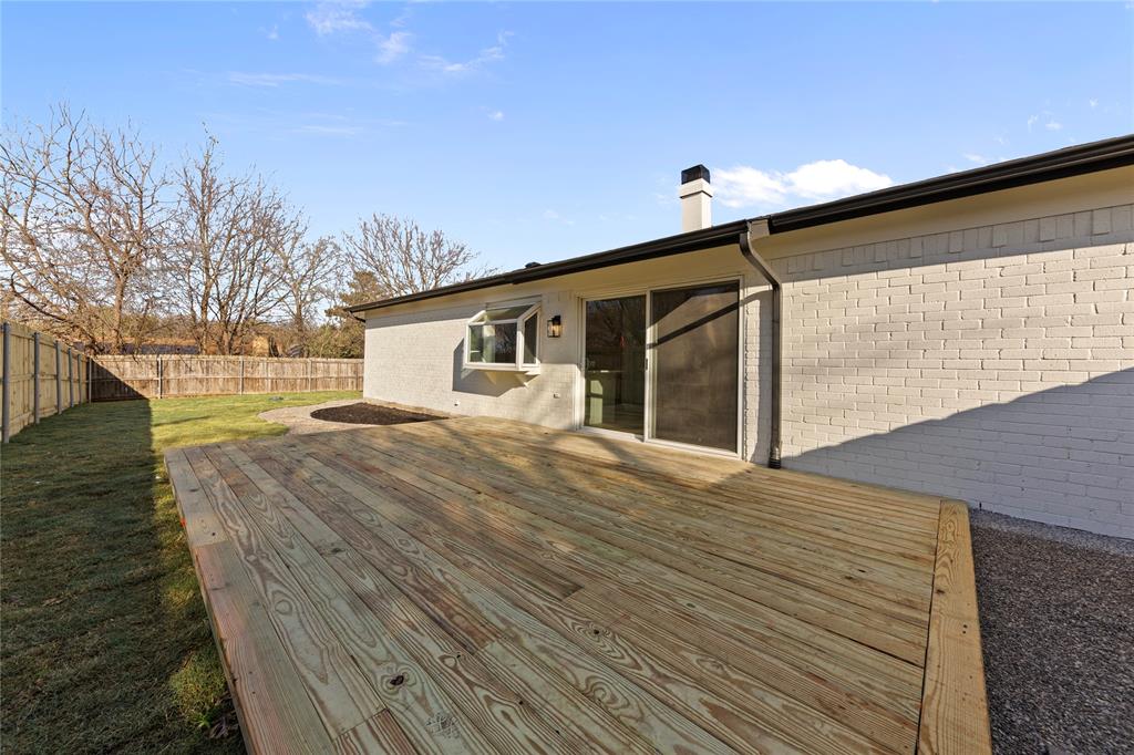 3121 Wayfarer Road Bedford, TX 76021 - Photo 28 of 32 Wooden deck featuring a fenced backyard