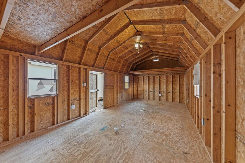3121 Wayfarer Road Bedford, TX 76021 - Photo 30 of 32 View of the expansive interior of the barn-style backyard shed