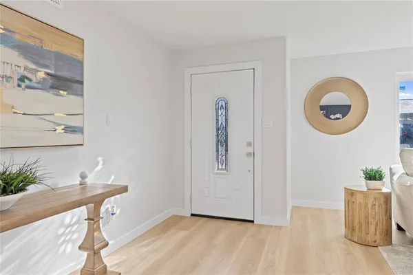 a view of livingroom with furniture and wooden floor