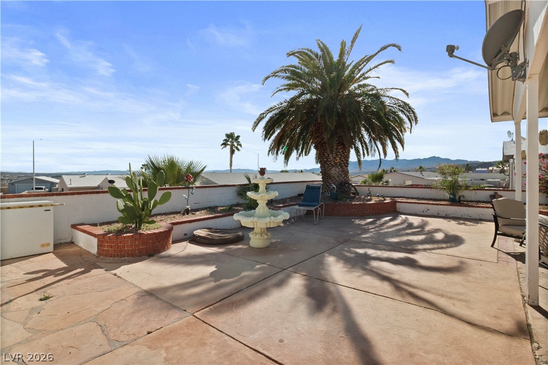 1655 Granada Street Laughlin, NV 89029 - Photo 39 of 76 View of patio / terrace featuring a mountain view