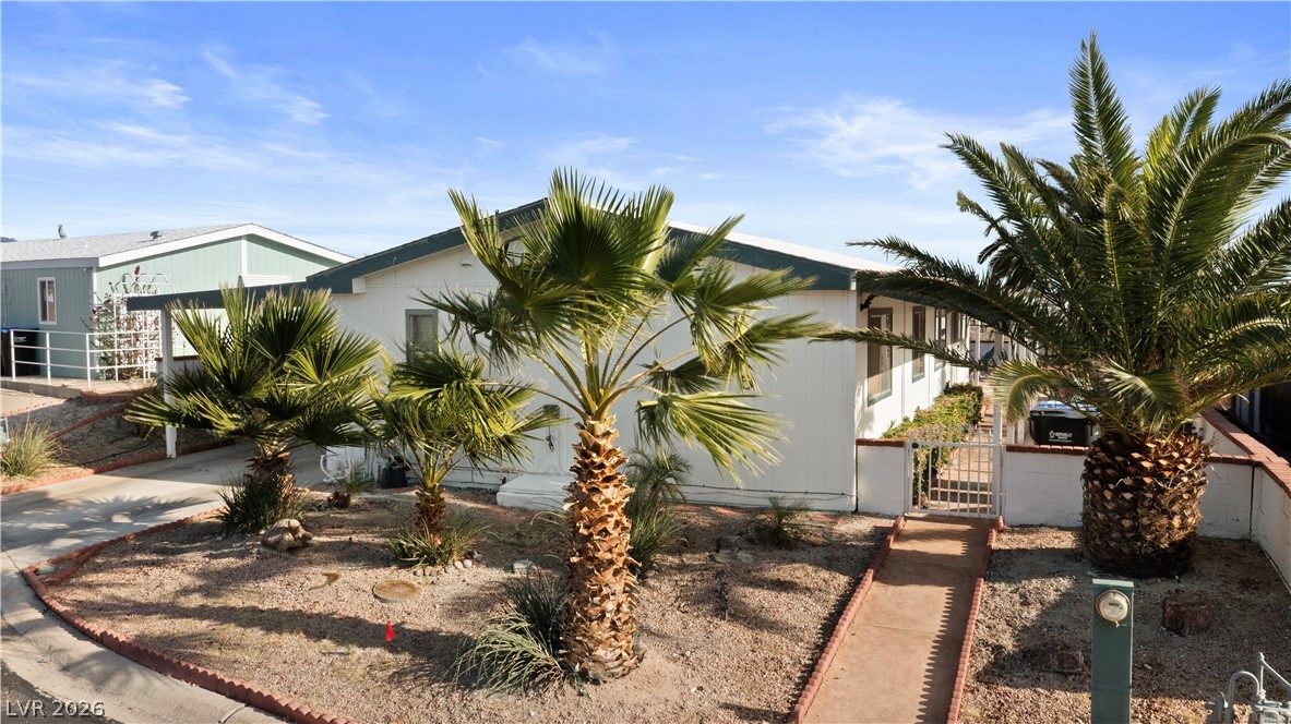 1655 Granada Street Laughlin, NV 89029 - Photo 52 of 76 View of front of property with a gate and stucco siding