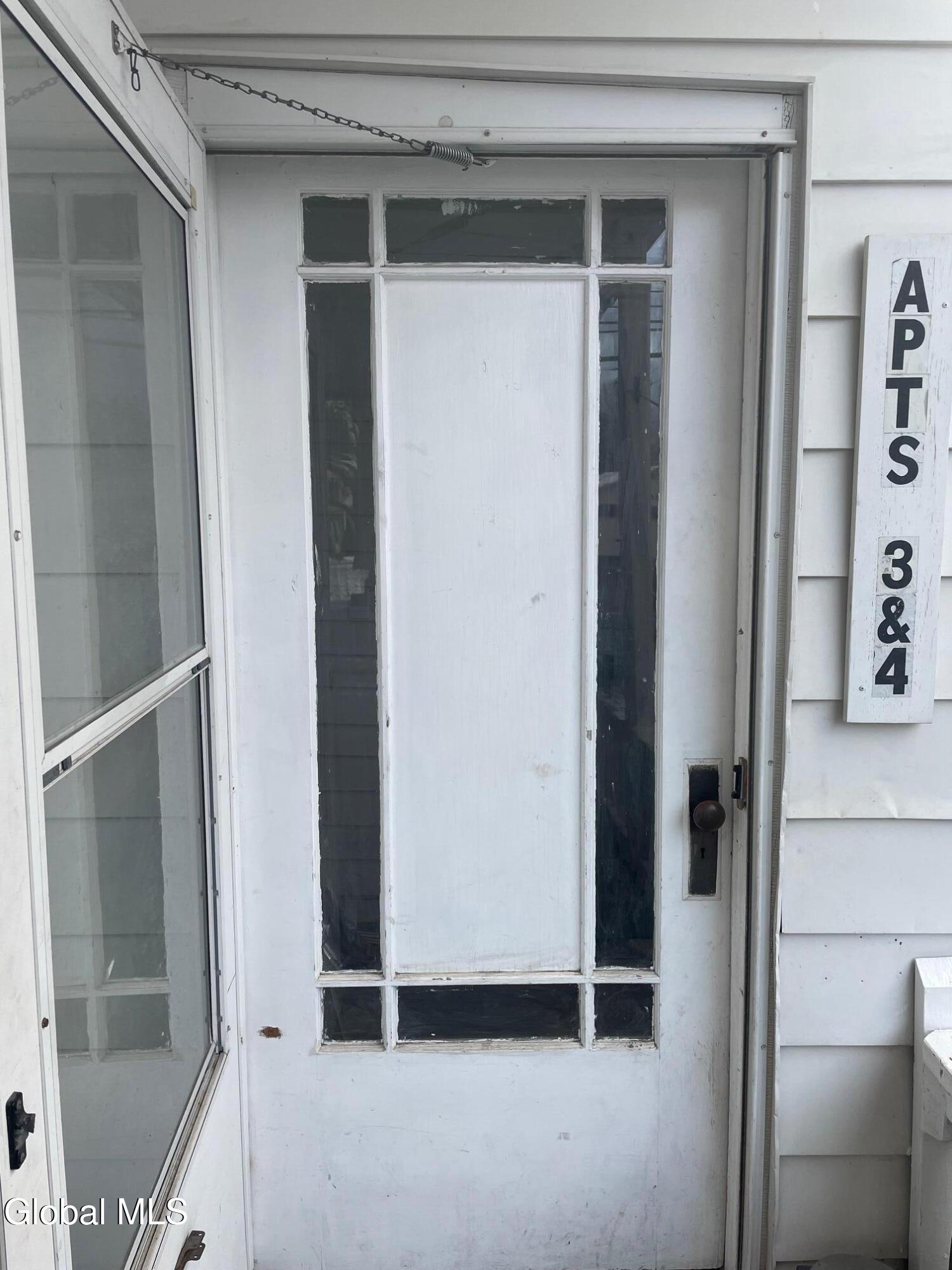 140 Wells Avenue, Unit 3 Middleburgh, NY 12122 - Photo 4 of 17 Side porch entrance