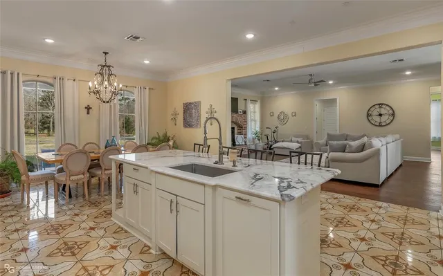 a bathroom with sinks a large mirror and a shower