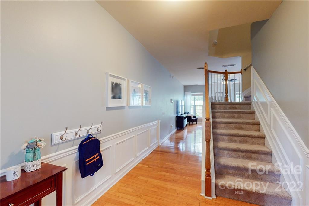 9136 Redmond Trace Road Charlotte, NC 28277 - Photo 12 of 37 a living room with furniture and a wooden floor
