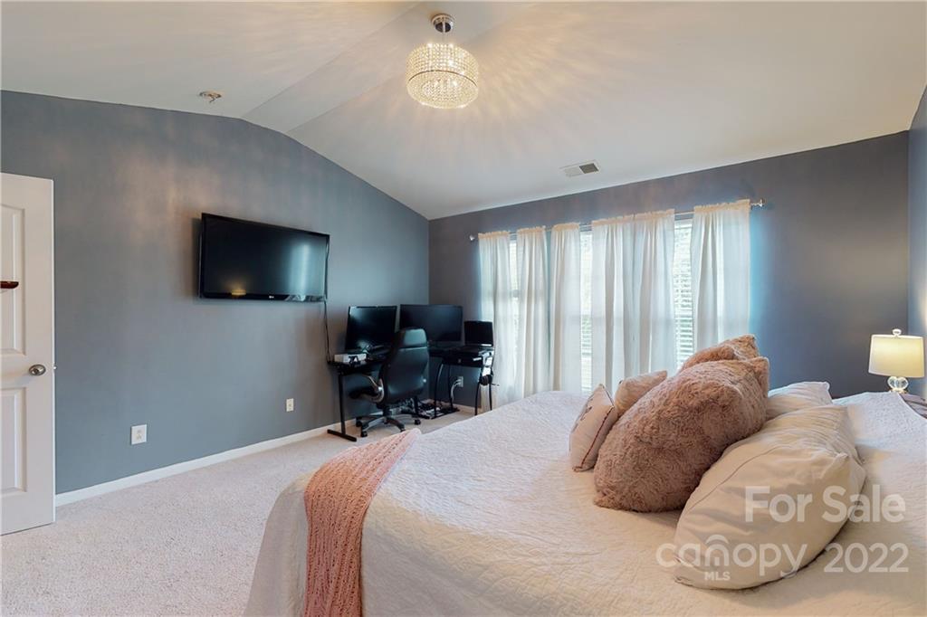 9136 Redmond Trace Road Charlotte, NC 28277 - Photo 21 of 37 a bedroom with bed tv and window