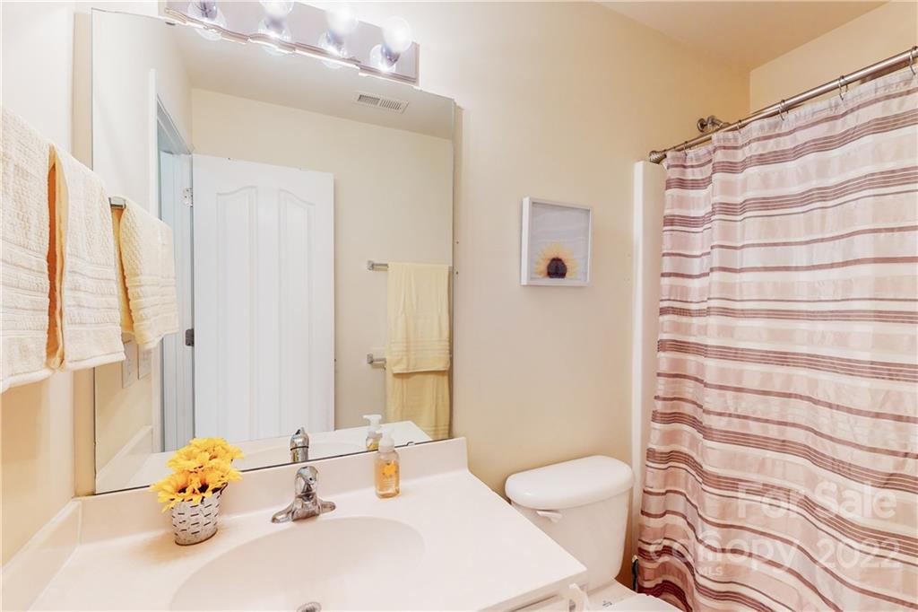 9136 Redmond Trace Road Charlotte, NC 28277 - Photo 28 of 37 a bathroom with a sink toilet and shower