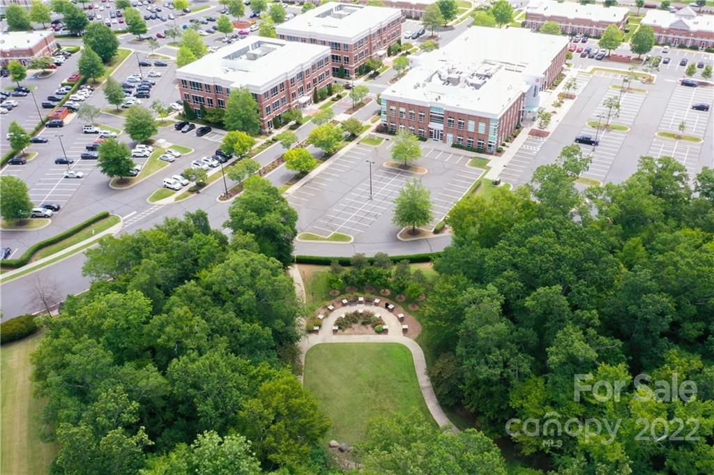 9136 Redmond Trace Road Charlotte, NC 28277 - Photo 35 of 37 an aerial view of a house with a garden and swimming pool