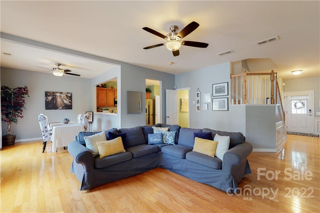 9136 Redmond Trace Road Charlotte, NC 28277 - Photo 7 of 37 a living room with furniture and a view of kitchen
