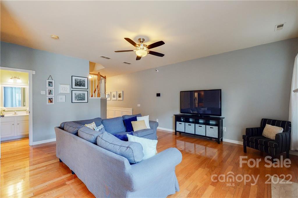 9136 Redmond Trace Road Charlotte, NC 28277 - Photo 8 of 37 a living room with furniture and a flat screen tv