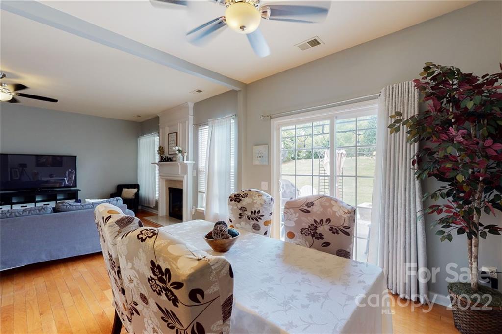 9136 Redmond Trace Road Charlotte, NC 28277 - Photo 10 of 37 a living room with furniture and a flat screen tv