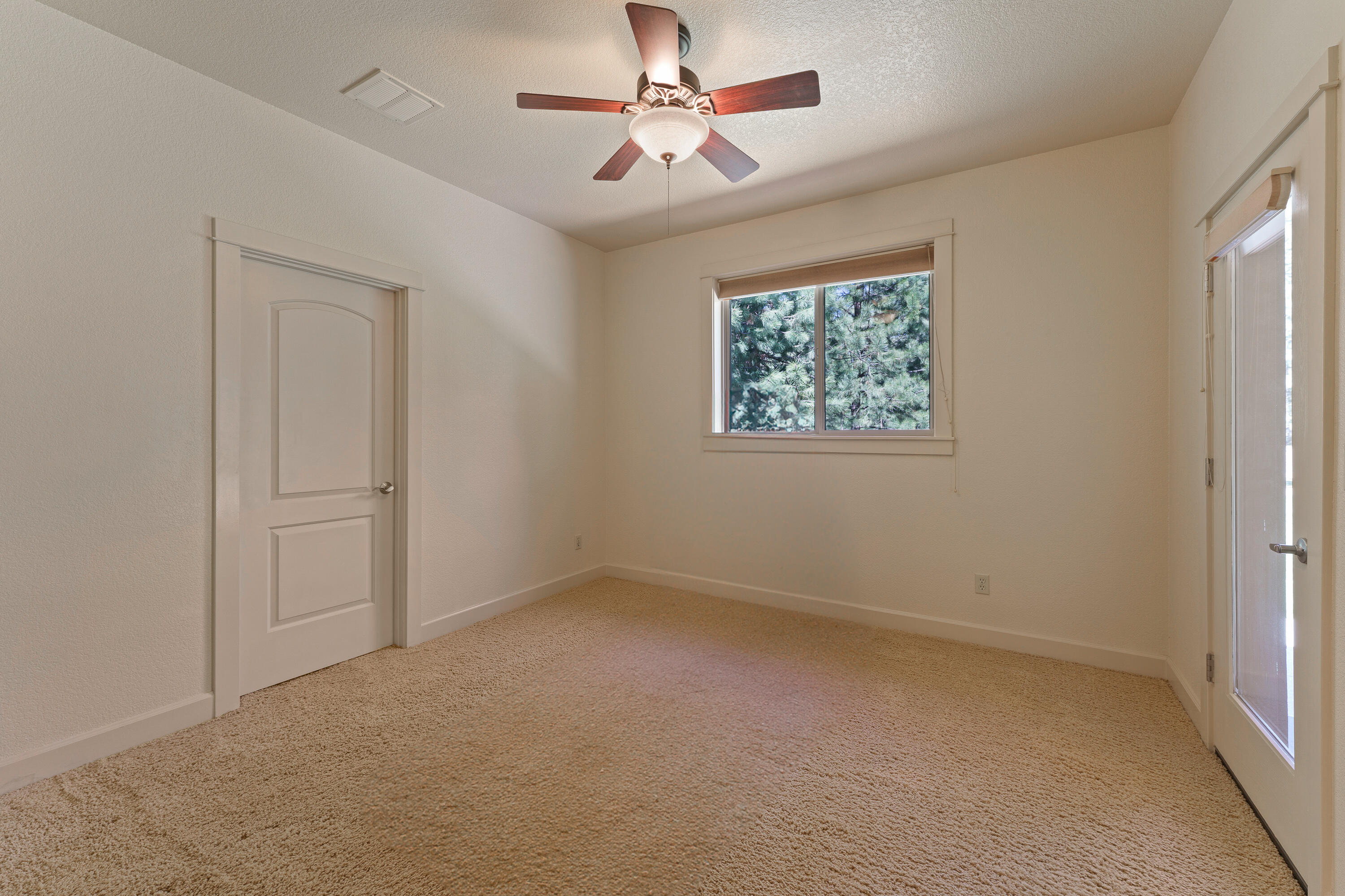 19236 Kiowa Road Bend, OR 97702 - Photo 26 of 52 a view of an empty room with a window