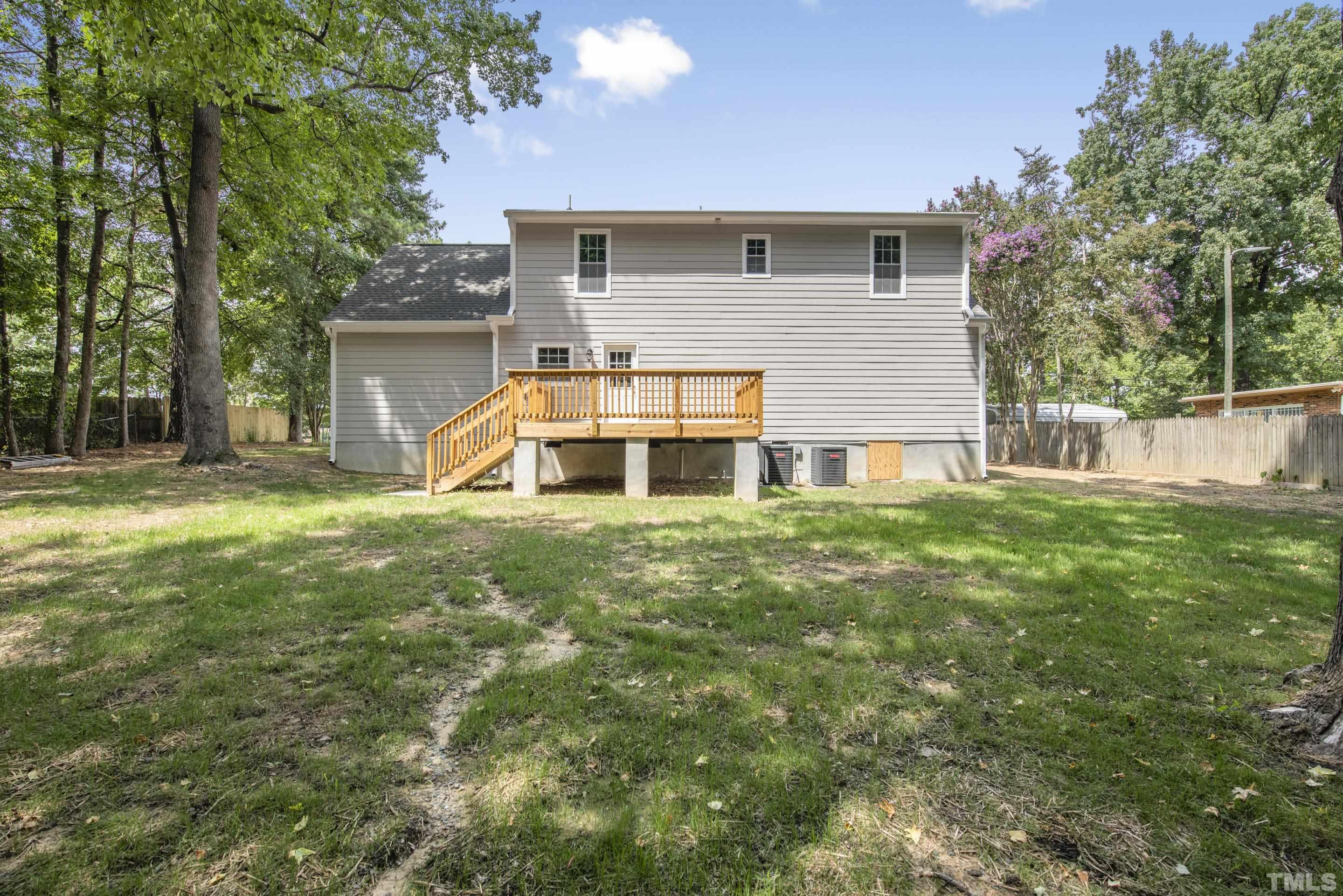 212 Junction Road Durham, NC 27703 - Photo 48 of 50 a front view of a house with a yard