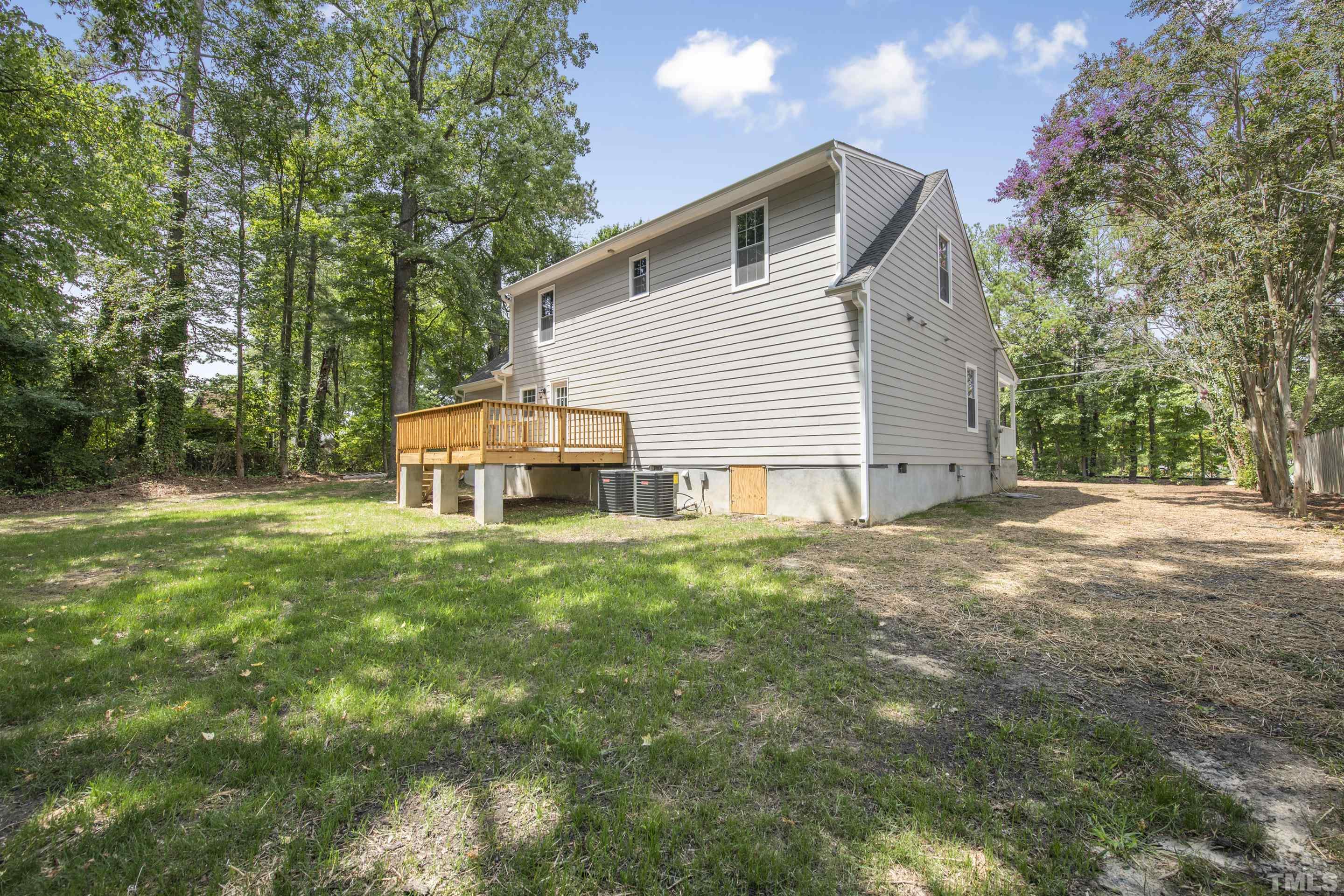 212 Junction Road Durham, NC 27703 - Photo 50 of 50 a view of a house with backyard and garden