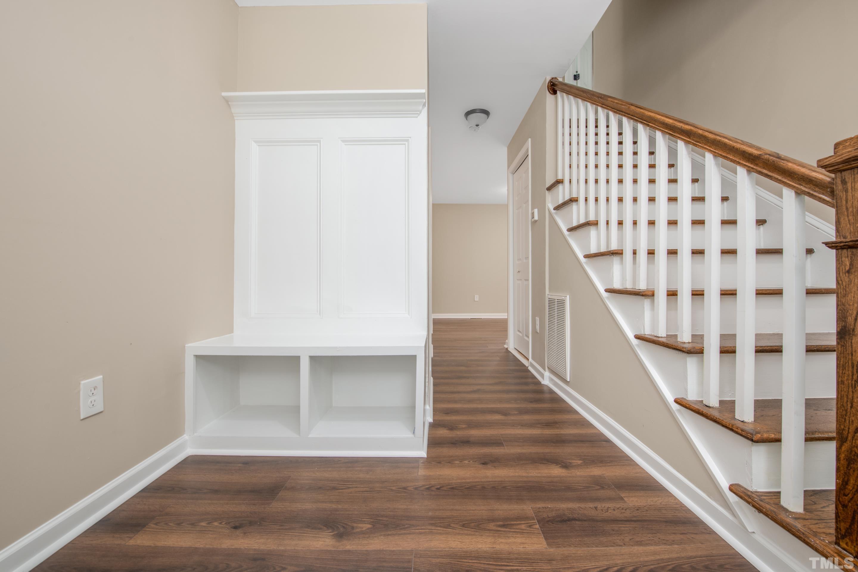 212 Junction Road Durham, NC 27703 - Photo 7 of 50 a view of staircase with white walls and a window