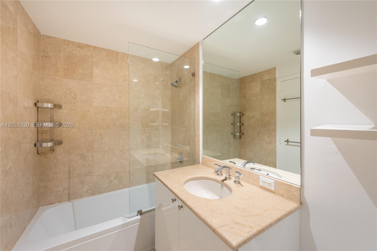 901 Brickell Key Boulevard, Unit 2006 Miami, FL 33131 - Photo 28 of 41 2nd Bathroom - Tub/Shower - Marble