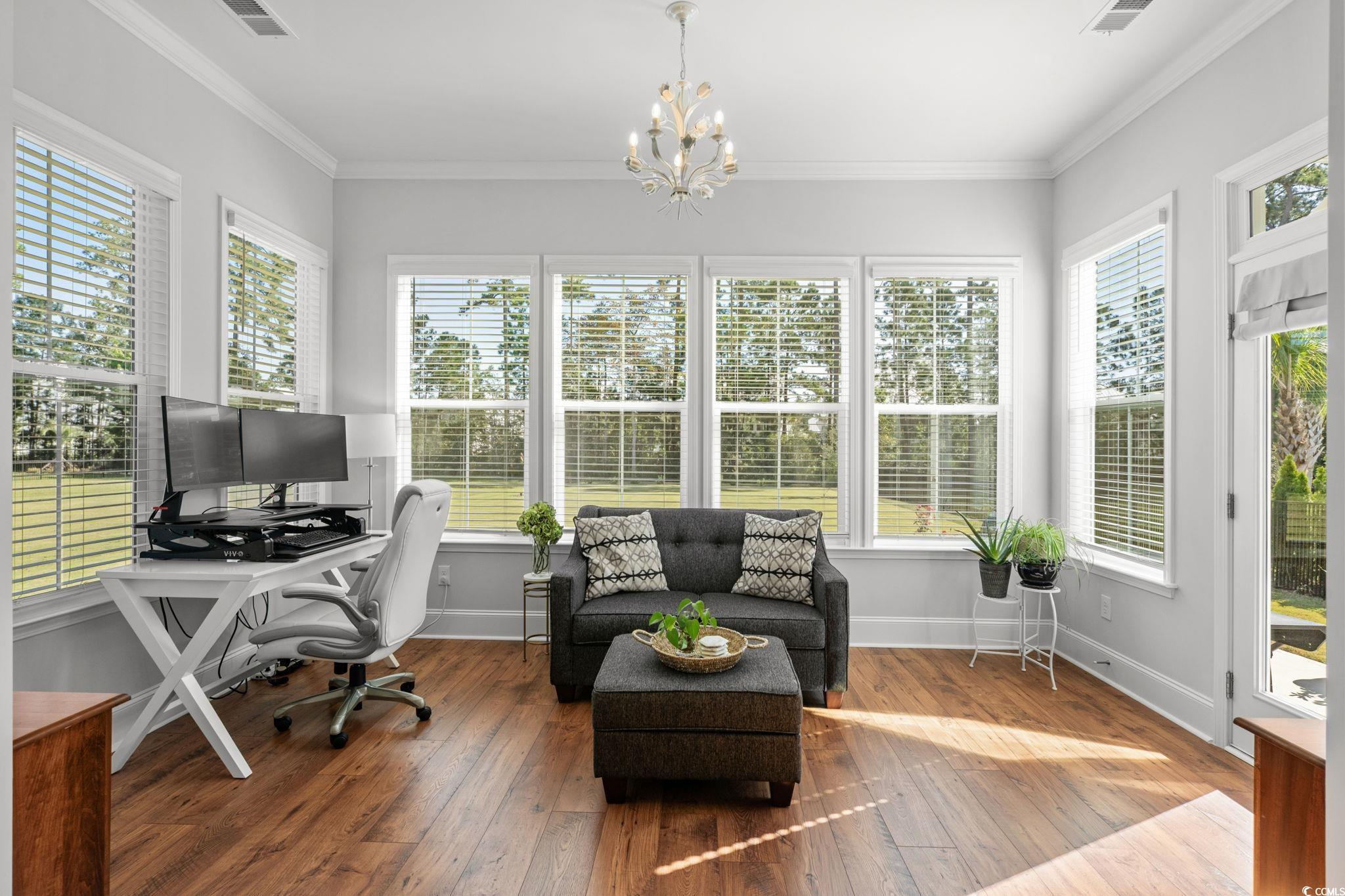 191 Blackwater Drive Murrells Inlet, SC 29576 - Photo 13 of 40 Office area featuring hardwood / wood-style flooring, ornamental molding, and a chandelier