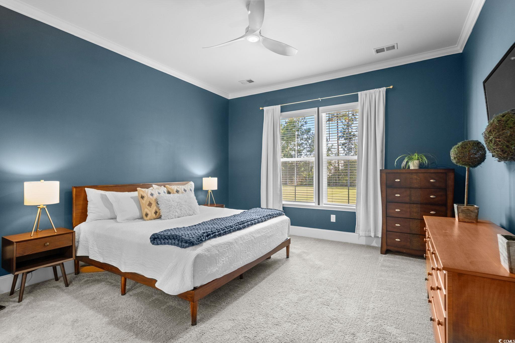 191 Blackwater Drive Murrells Inlet, SC 29576 - Photo 15 of 40 Bedroom featuring ornamental molding, light colored carpet, and a ceiling fan