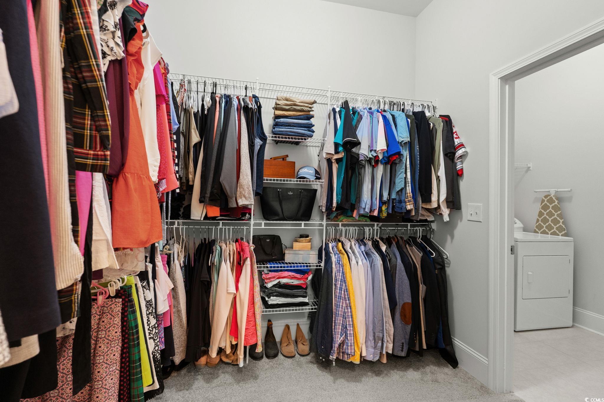 191 Blackwater Drive Murrells Inlet, SC 29576 - Photo 20 of 40 Walk in closet featuring washer / clothes dryer and light carpet
