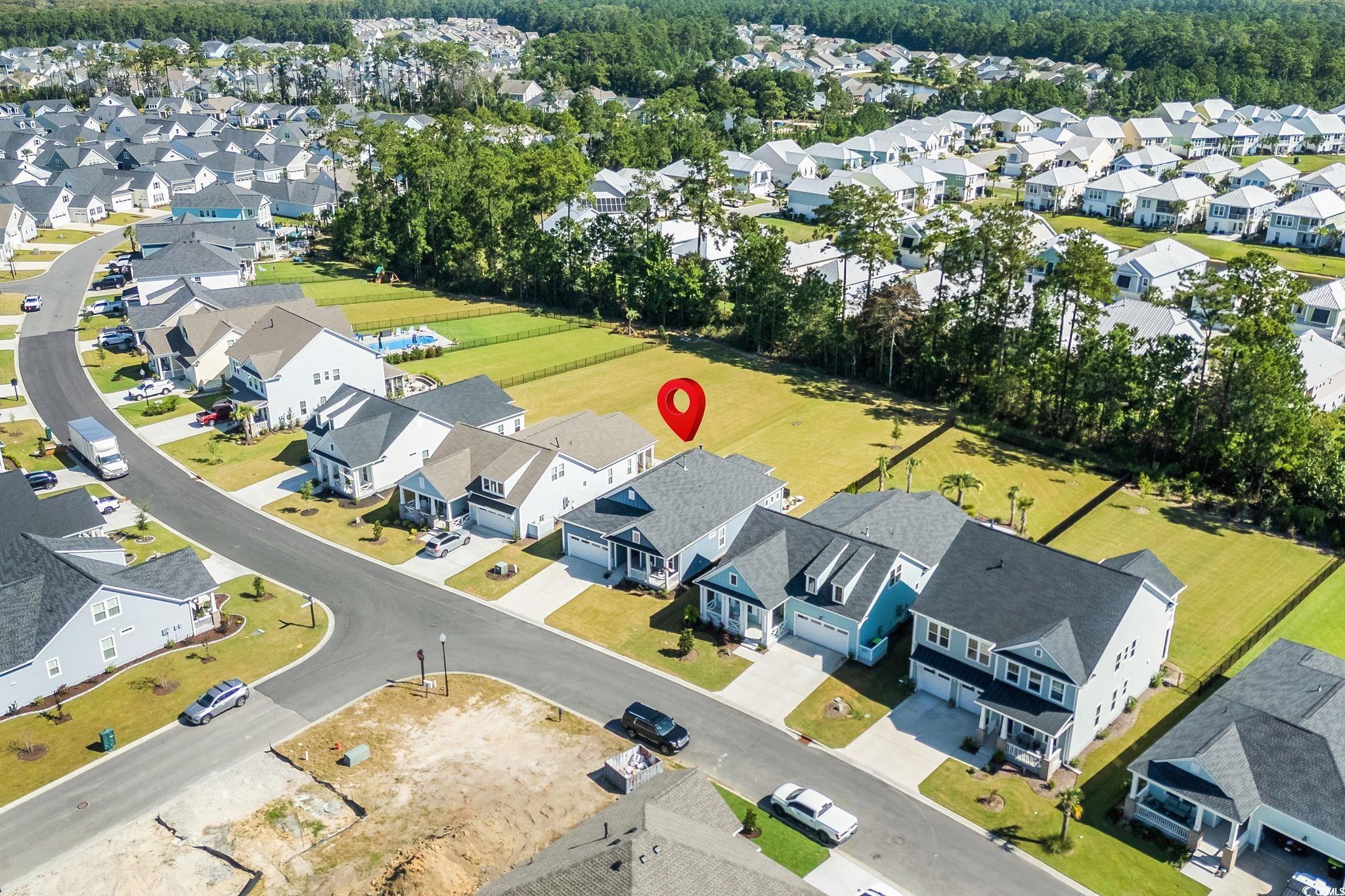 191 Blackwater Drive Murrells Inlet, SC 29576 - Photo 3 of 40 Aerial view of property's location with nearby suburban area